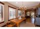 Dining room featuring hardwood floors, natural light, and view of the kitchen at 669 S Washington St, Denver, CO 80209