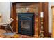 Close-up of a decorative fireplace with tile surround and vintage details at 669 S Washington St, Denver, CO 80209
