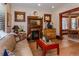 Comfortable living room showcasing hardwood floors, a decorative fireplace, and an open layout at 669 S Washington St, Denver, CO 80209