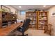 Home office with built-in bookshelves and desk with lots of storage at 669 S Washington St, Denver, CO 80209
