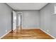 Bedroom featuring hardwood floors and a gray paint at 6895 W Oregon Dr, Lakewood, CO 80232