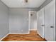 Bedroom featuring hardwood floors, and a closet at 6895 W Oregon Dr, Lakewood, CO 80232