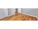 Bedroom with gleaming hardwood floors, and a closet at 6895 W Oregon Dr, Lakewood, CO 80232