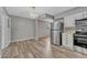 Bright kitchen with laminate floors and stainless appliances at 6895 W Oregon Dr, Lakewood, CO 80232