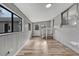 Bright laundry room with new washer and dryer and many windows at 6895 W Oregon Dr, Lakewood, CO 80232