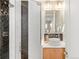 Modern bathroom showcases sleek tiling, a glass-enclosed shower, and vessel sink at 340 S Lafayette St # 201, Denver, CO 80209
