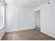 Bedroom with carpet, light blue walls, and entry door at 340 S Lafayette St # 201, Denver, CO 80209