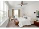 Bright and airy bedroom with access to a balcony and modern design elements at 340 S Lafayette St # 201, Denver, CO 80209