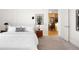 Cozy bedroom featuring a comfortable bed and stylish décor, with view to the kitchen at 340 S Lafayette St # 201, Denver, CO 80209