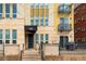 Building entrance featuring a large black awning and secure entry access at 340 S Lafayette St # 201, Denver, CO 80209