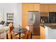Modern kitchen blending wooden cabinetry with stainless steel appliances at 340 S Lafayette St # 201, Denver, CO 80209
