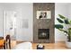 Modern fireplace with decorative tile surround, complementing the open-concept living space at 340 S Lafayette St # 201, Denver, CO 80209