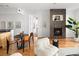 Bright living room showcasing a fireplace and open-concept design at 340 S Lafayette St # 201, Denver, CO 80209