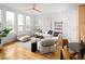 Open concept living area boasting hardwood floors, neutral tones, and modern furnishings at 340 S Lafayette St # 201, Denver, CO 80209