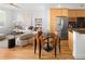 Open-concept living space combines kitchen and living room at 340 S Lafayette St # 201, Denver, CO 80209