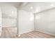 Unfinished basement with wood look floors and recessed lighting provides ample space at 379 Remuda Rd, Berthoud, CO 80513