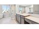 Primary bathroom featuring enclosed shower, vanity, and tub at 1699 Morgan Dr, Erie, CO 80516