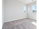 Bedroom with carpeted flooring and lots of natural light at 1699 Morgan Dr, Erie, CO 80516