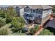 Aerial view of backyard with well-maintained landscaping, patio, and access to deck at 6345 S Ider Way, Aurora, CO 80016