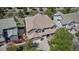 Aerial view of home features a large yard, mature trees, and a well-maintained exterior at 6345 S Ider Way, Aurora, CO 80016