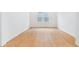 Bright bedroom featuring wood floors and a bank of windows to let in natural light at 9322 Quaker St, Arvada, CO 80007