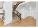 Spacious front foyer features stairs to the second level and access to the kitchen at 9322 Quaker St, Arvada, CO 80007