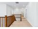 Hallway with hardwood floors and views from the staircase at 9322 Quaker St, Arvada, CO 80007
