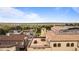 An aerial view looks out to city views from the rooftop deck of this community at 4625 W 50Th Ave # 304, Denver, CO 80212