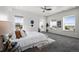 Spacious main bedroom featuring lots of natural light, and cozy neutral tones at 4625 W 50Th Ave # 304, Denver, CO 80212