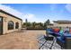 A spacious roof deck is furnished with a patio set and conversation set with plush seating at 4625 W 50Th Ave # 304, Denver, CO 80212