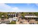 Lively street view featuring a variety of businesses, modern apartments, and tree-lined streets at 4625 W 50Th Ave # 304, Denver, CO 80212