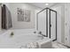 Relaxing bathroom with a jacuzzi tub and a separate glass-enclosed shower at 12366 Nate Cir, Parker, CO 80134
