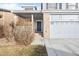 Charming home featuring a covered front porch and an attached garage at 12366 Nate Cir, Parker, CO 80134