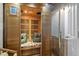 Home sauna featuring wood construction, bench seating and see-through glass door at 12366 Nate Cir, Parker, CO 80134