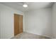 Bedroom features a large closet, neutral carpet, and ceiling fan at 7552 Garland St, Arvada, CO 80005