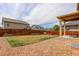 A well-maintained backyard features a patio, fence, and lush grassy area at 467 S 36Th Ave, Brighton, CO 80601