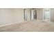 Bedroom featuring neutral carpet and walls with doors leading to other rooms at 467 S 36Th Ave, Brighton, CO 80601