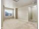 Bright bedroom with carpeted floors and large window at 467 S 36Th Ave, Brighton, CO 80601