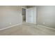 Bedroom featuring neutral walls, carpet, and a closet with sliding doors at 467 S 36Th Ave, Brighton, CO 80601