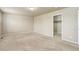 Neutral carpeted bedroom with beige walls and a door leading to a closet at 467 S 36Th Ave, Brighton, CO 80601