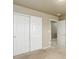 Bedroom featuring neutral walls, carpet, and a closet with sliding doors at 467 S 36Th Ave, Brighton, CO 80601