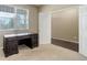 Bedroom with neutral carpet, a desk, and an open closet at 467 S 36Th Ave, Brighton, CO 80601