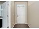 Entryway with hardwood floors, neutral paint, and a white door at 467 S 36Th Ave, Brighton, CO 80601