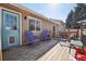 Inviting back deck with outdoor seating, perfect for relaxing or entertaining at 6393 S Johnson St, Littleton, CO 80123