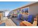 Charming back deck with colorful chairs, offering a relaxing outdoor space at 6393 S Johnson St, Littleton, CO 80123