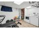 Partially finished basement with laundry area, storage, and potential for customization at 6393 S Johnson St, Littleton, CO 80123