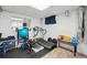 Finished basement featuring workout equipment and plenty of space for activities at 6393 S Johnson St, Littleton, CO 80123