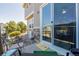 Private patio area with outdoor seating, stone accents, and sliding door access at 9047 Apache Plume Dr # D, Parker, CO 80134