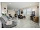 Bright and airy living room with updated flooring and large windows at 9047 Apache Plume Dr # D, Parker, CO 80134