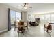 Bright open concept living space featuring plenty of natural light and backyard access at 9047 Apache Plume Dr # D, Parker, CO 80134